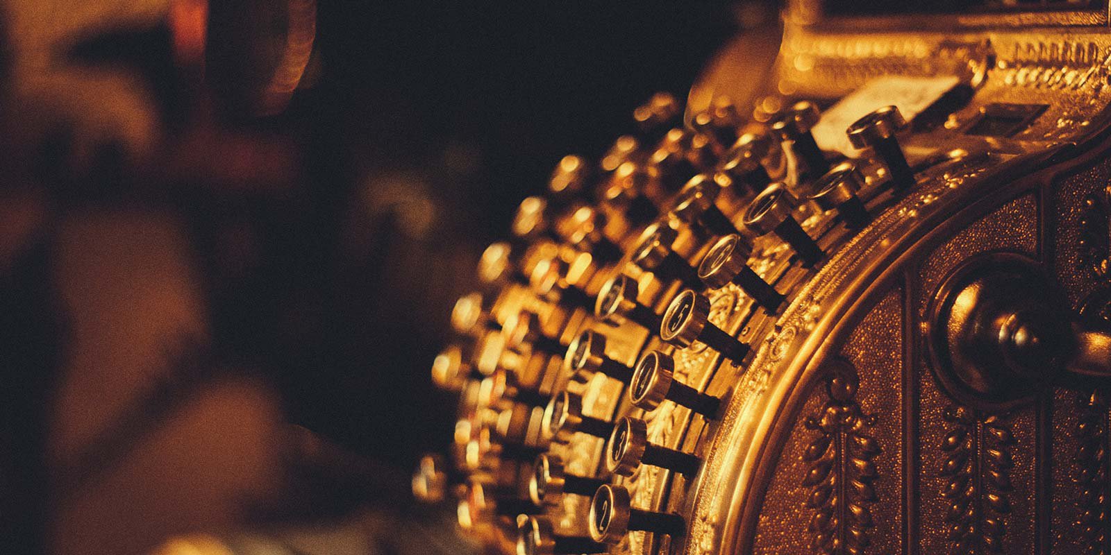 Golden antique cash register