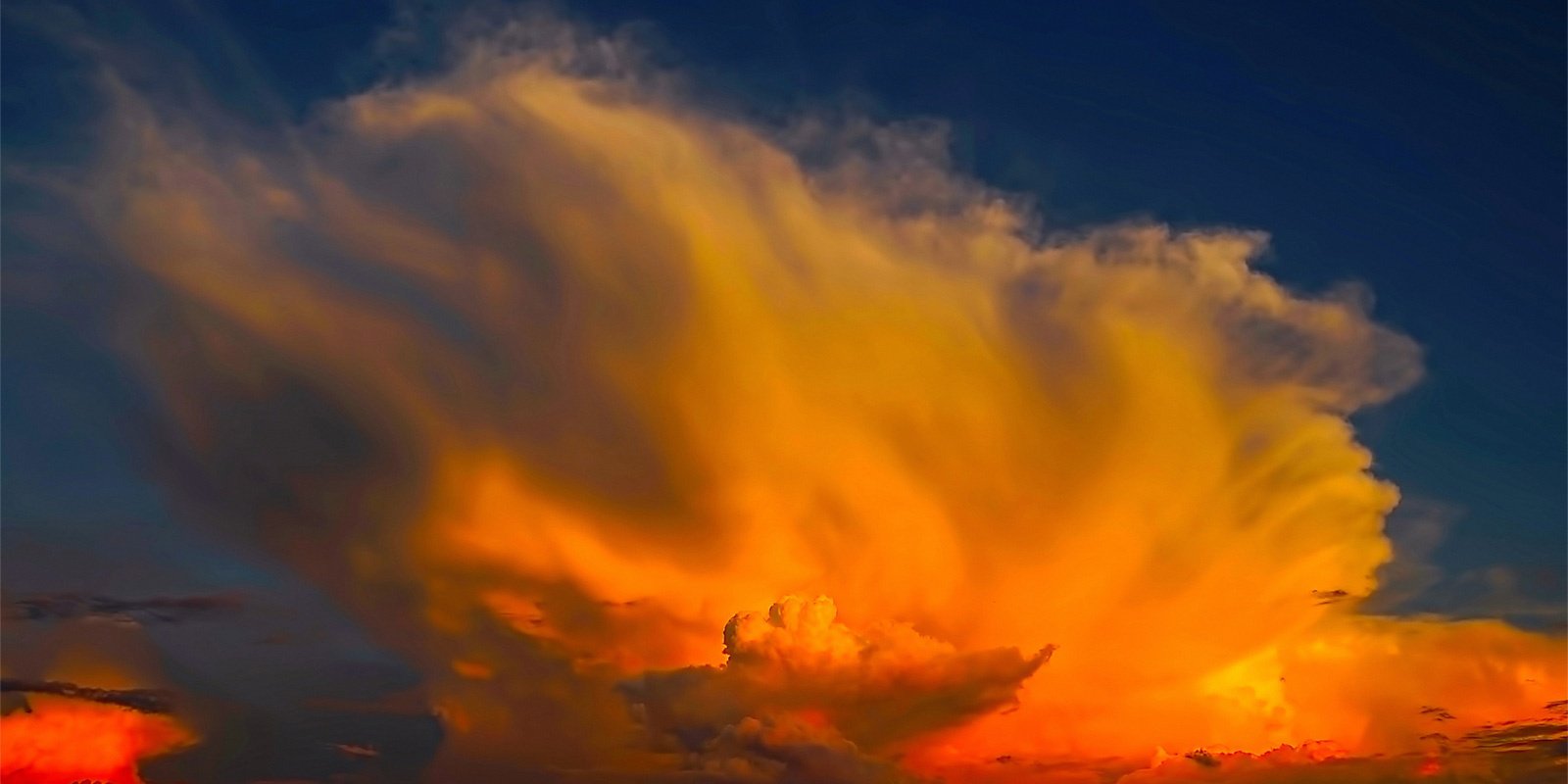Orange and red clouds at sunset